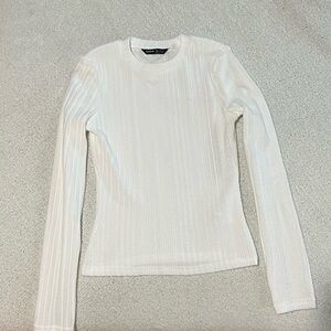 White long sleeve top.